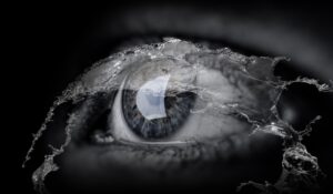 Image of eye with water flowing over it