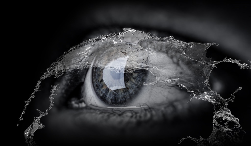 Image of eye with water flowing over it