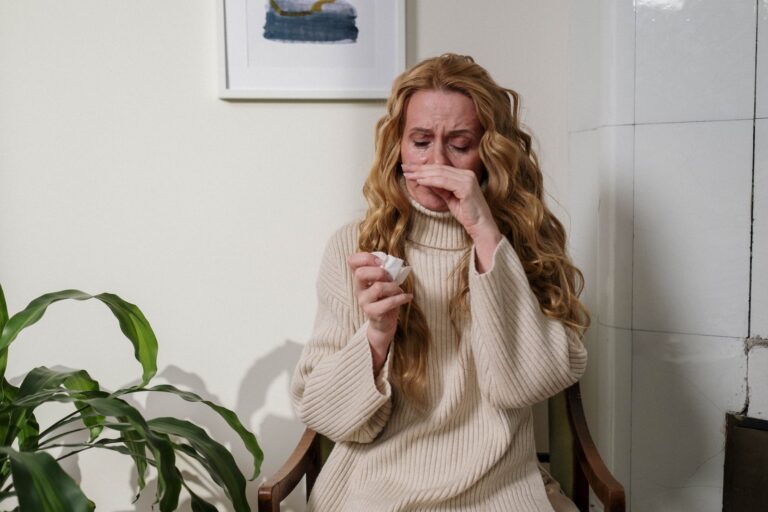 Spring Allergy Season: A Tale of Sniffles, Sneezes, and Itchy Eyes 2 woman suffering from her allergy